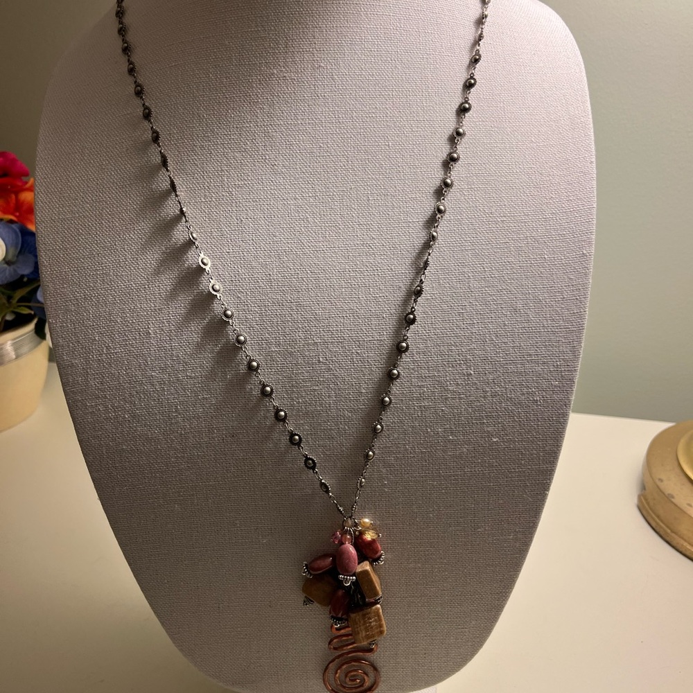 Stunning long necklace with charms